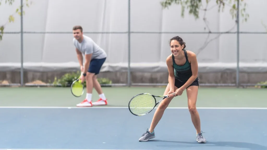 Teamwork in Win Doubles Tennis , overcoming challenges with strategic play.